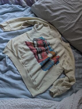 vintage NASCAR sweater women size xs-sm fits very snug on the waistline vs overs